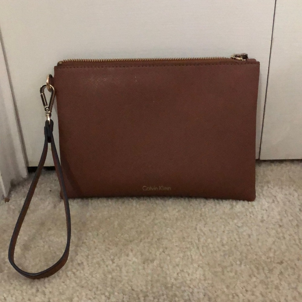 Calvin Klein brown wristlet. Gently used